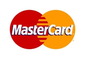 Das Mastercard-Logo Besteht Aus Zwei Überlappenden Kreisen In Rot Und Orange Und Dem Markennamen „Mastercard“ In Fetten Weißen Buchstaben In Der Mitte.